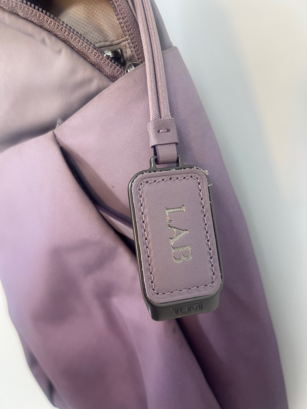 Tumi Ombre Lavender to Plum Sling Bag - Picture 10 of 13
